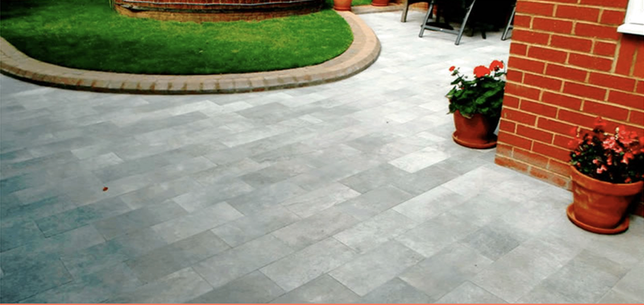 Paved patio area with low wall edging