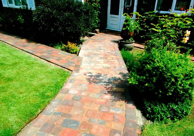 Brick paved path to front door